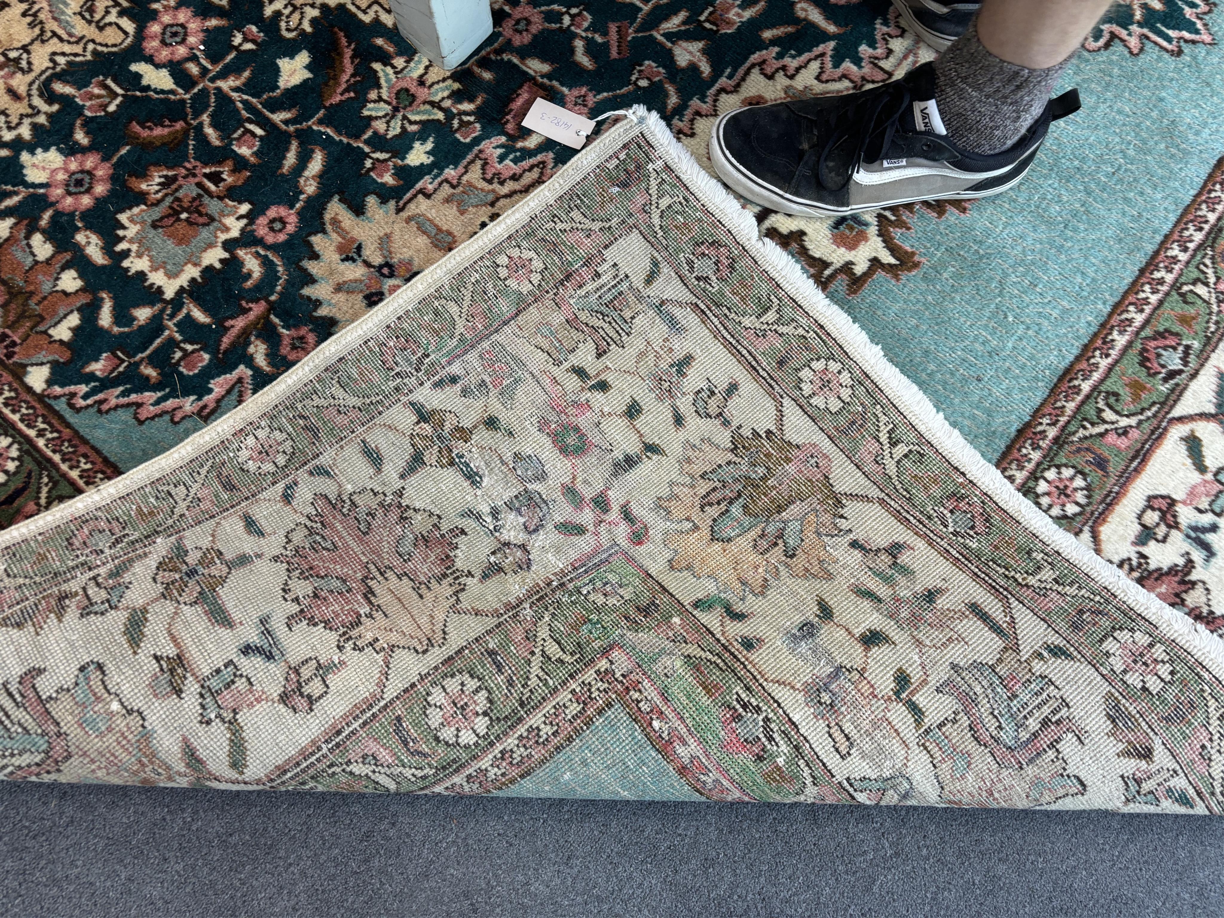 A Tabriz carpet, 400 x 310cm